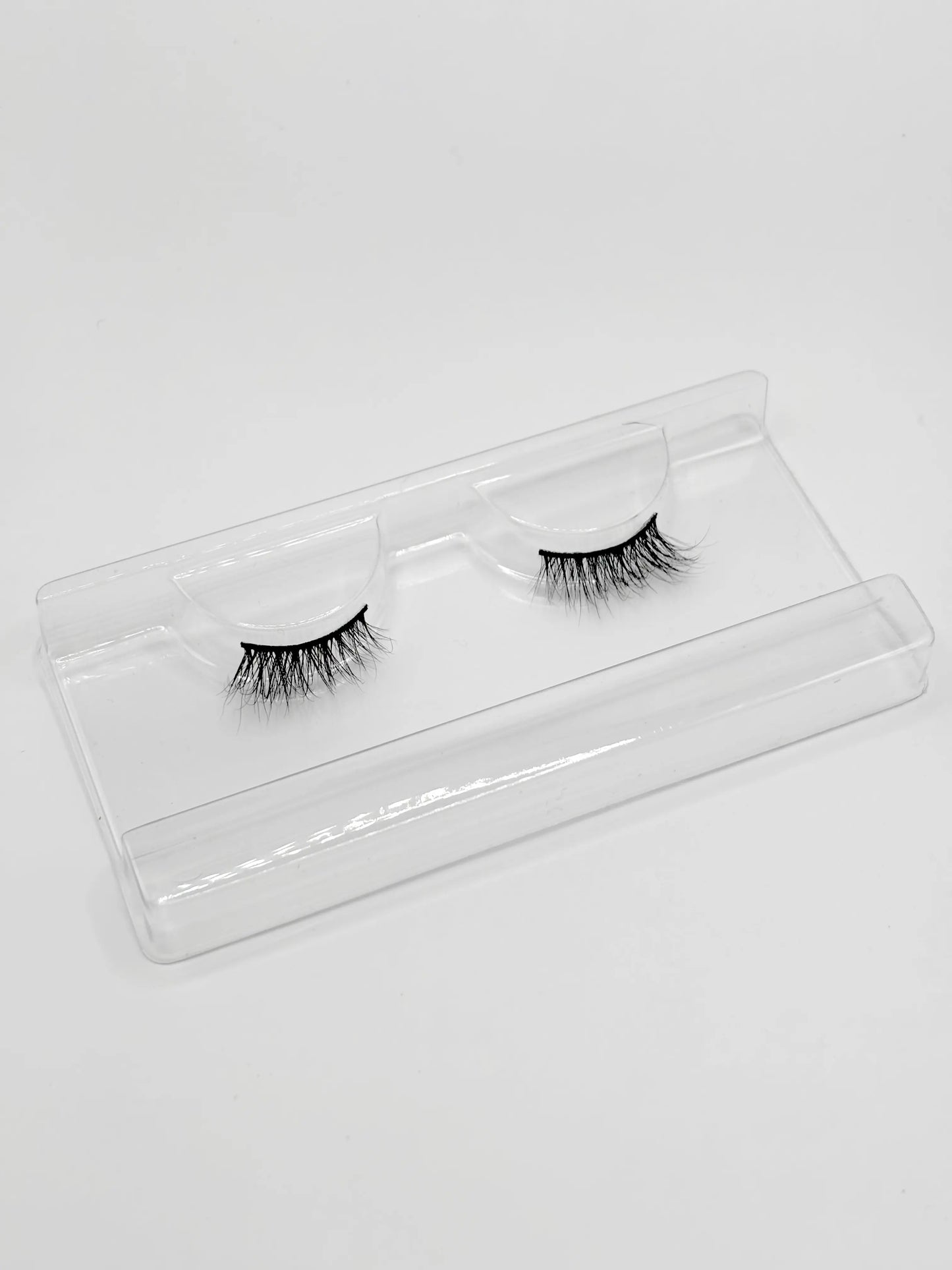 Levore Lashes AM Half Lash — half-length false lashes in clear plastic case